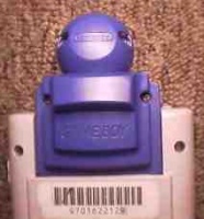 A blue Gameboy Camera in a grey DMG-01.
